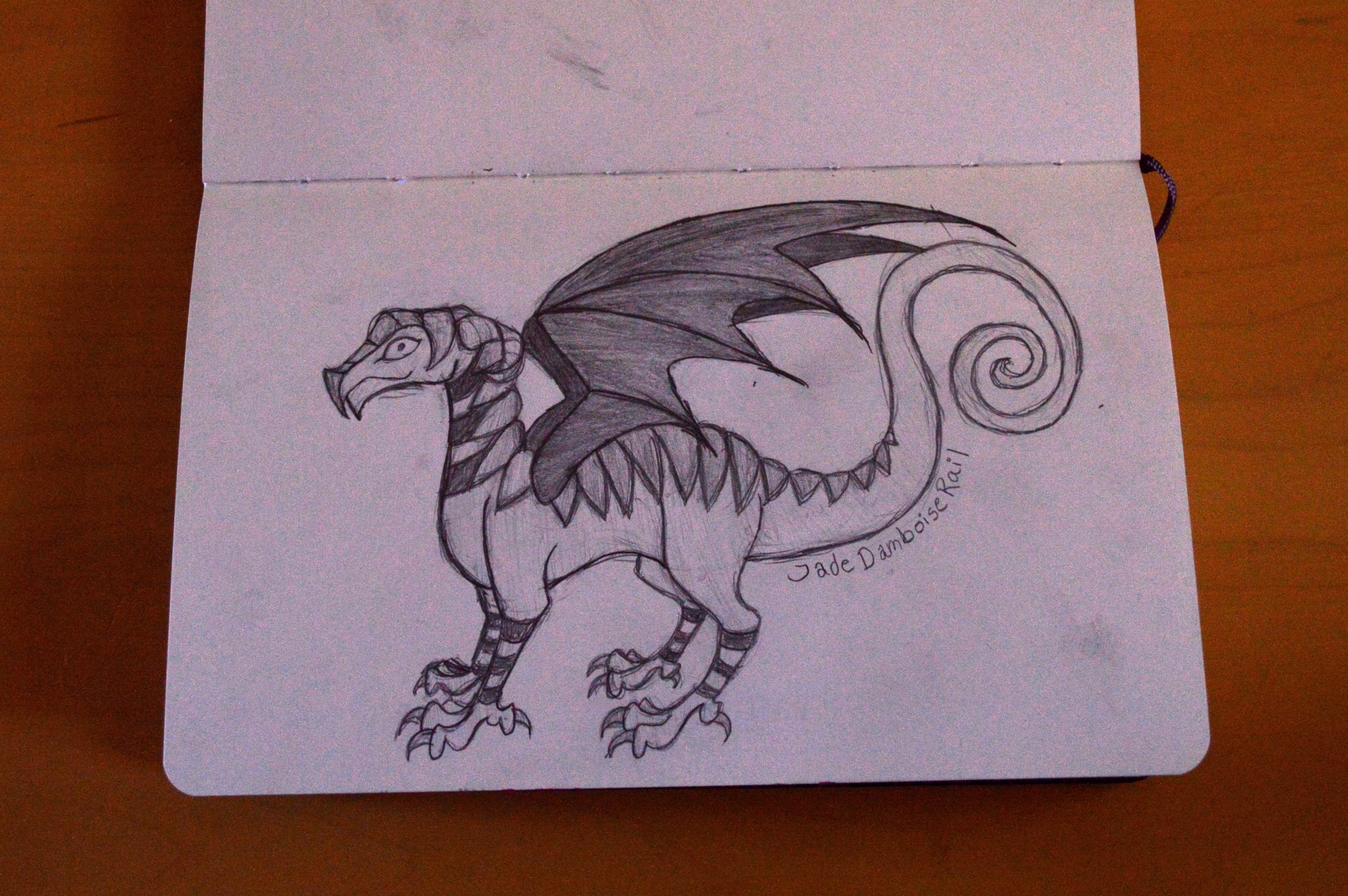 Sketch of a creepy smiling dragon from the side