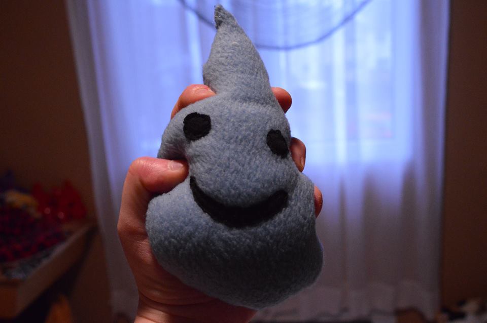 a plush toy shaped like a drop of water