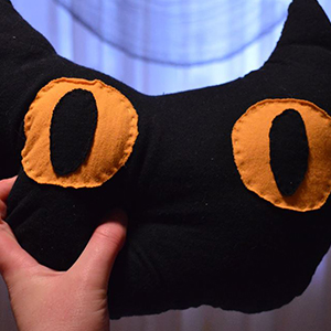 pillow shaped like a cat face