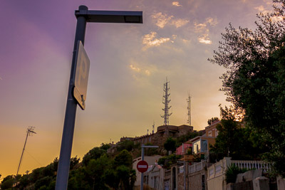 A picture of houses on top of a mountain