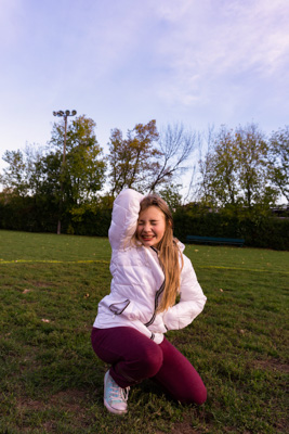 Photo of a girl posing in a park