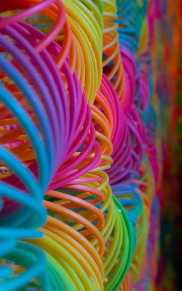 Photo of a rainbow slinky wall