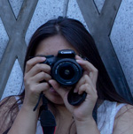 Claudia Galdones holding camera