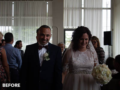 Before photo of the bride and broom walking down the aisle.