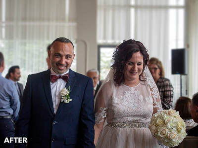 After photo of the bride and broom walking down the aisle.