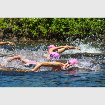 Triathlete swimmer Andreanne Briere breathing in a race
