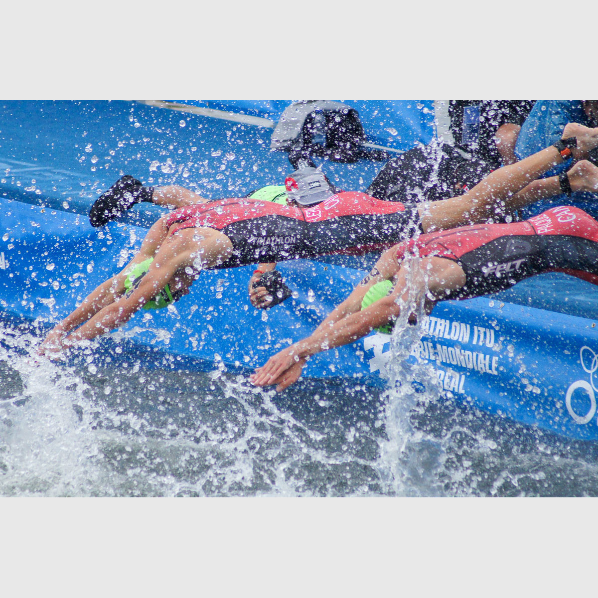 Charles Paquet and Alexis Lepage diving at Montreal ITU triathlon