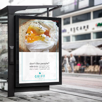 An outdoor advertisement for a fictional cafe