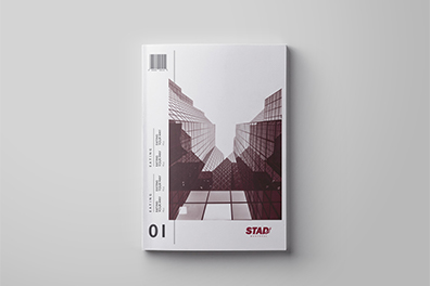 Stad magazine cover showing a red skyscraper on a white background