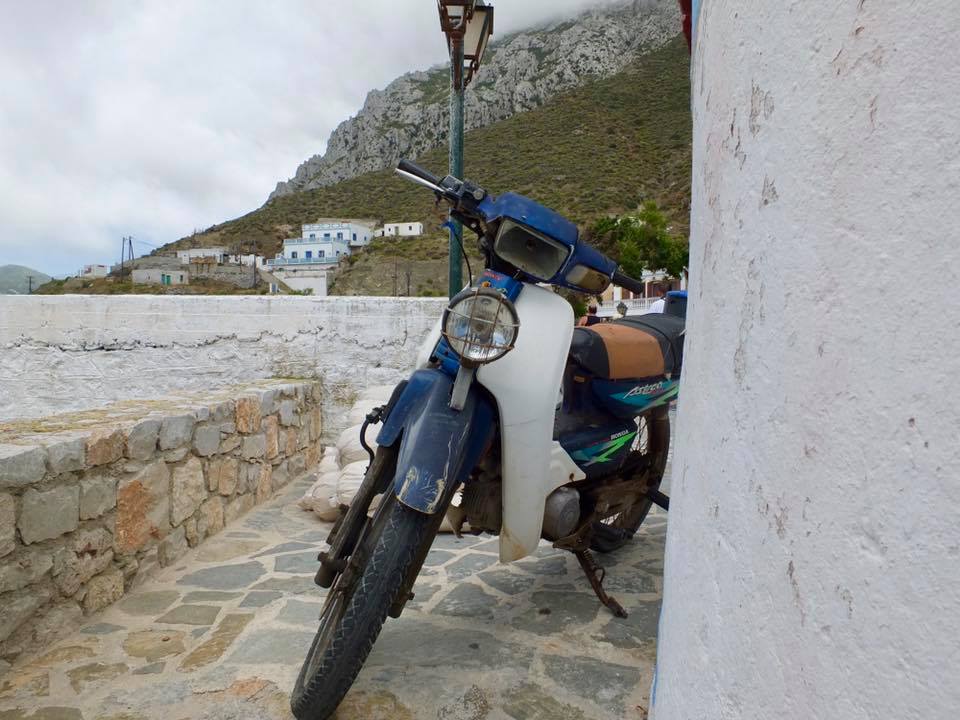 Photo of an old motorcycle in Karpathos, Greece that inspired the company name Foreign Freelancer 