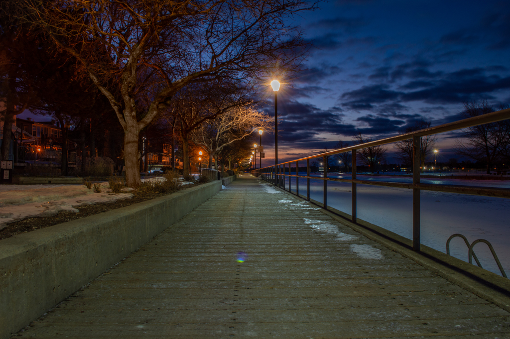 Single Point Perspective photo of the Sainte-Anne-De-Bellevue boardwalk at dusk