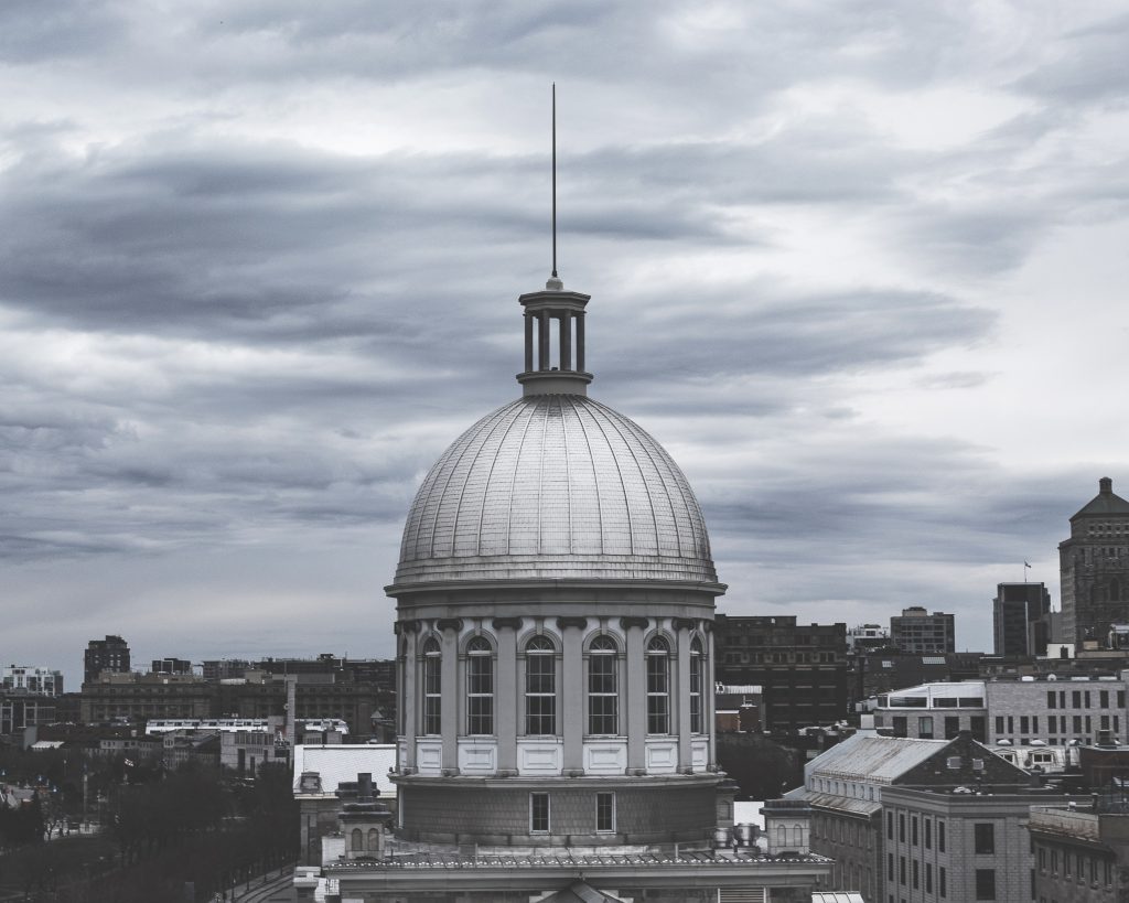 white Montreal Bonsecours dome on a cloudy day. Photo by William Denman
